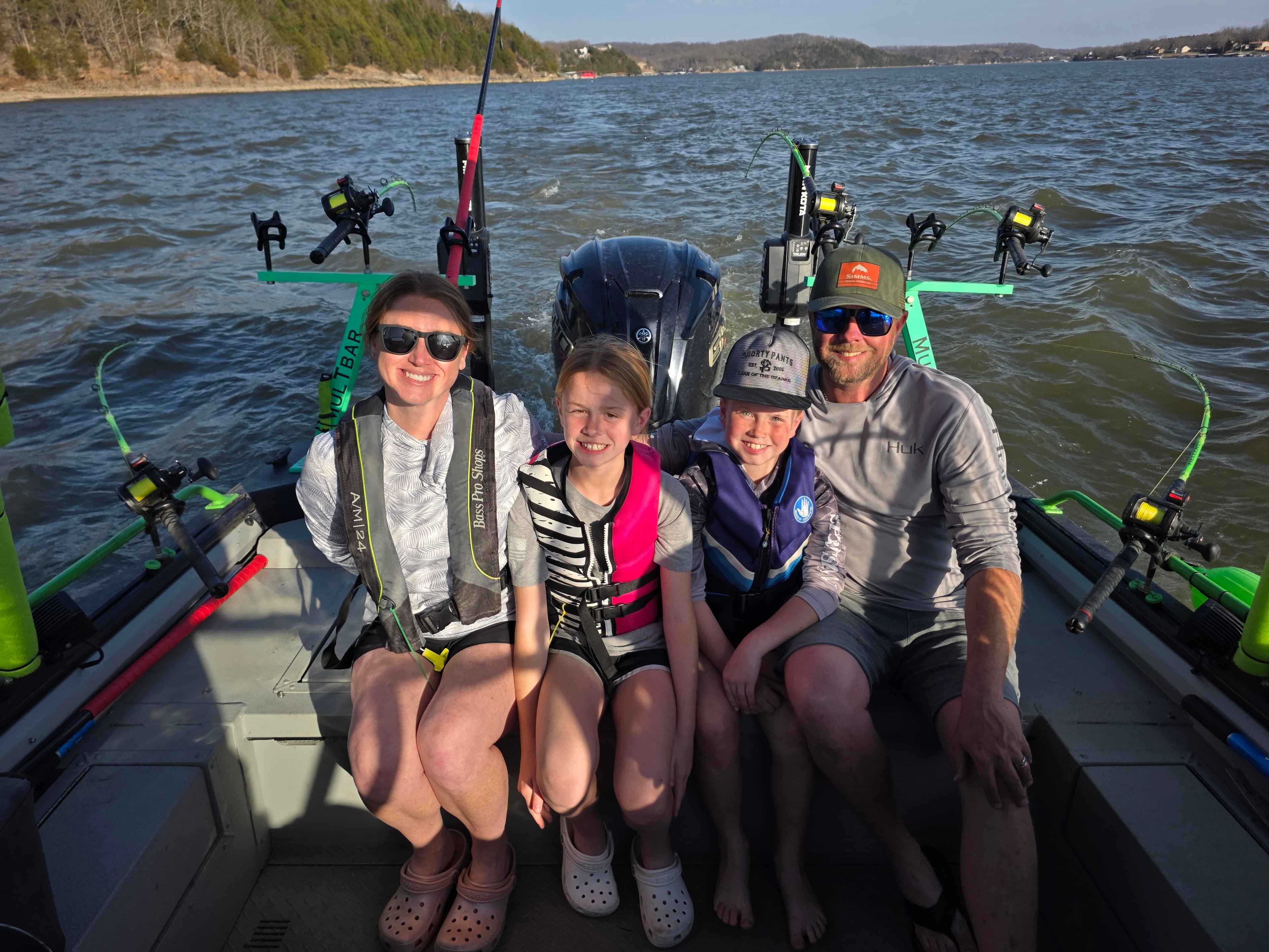 Captain TJ with a family group on the guide boat